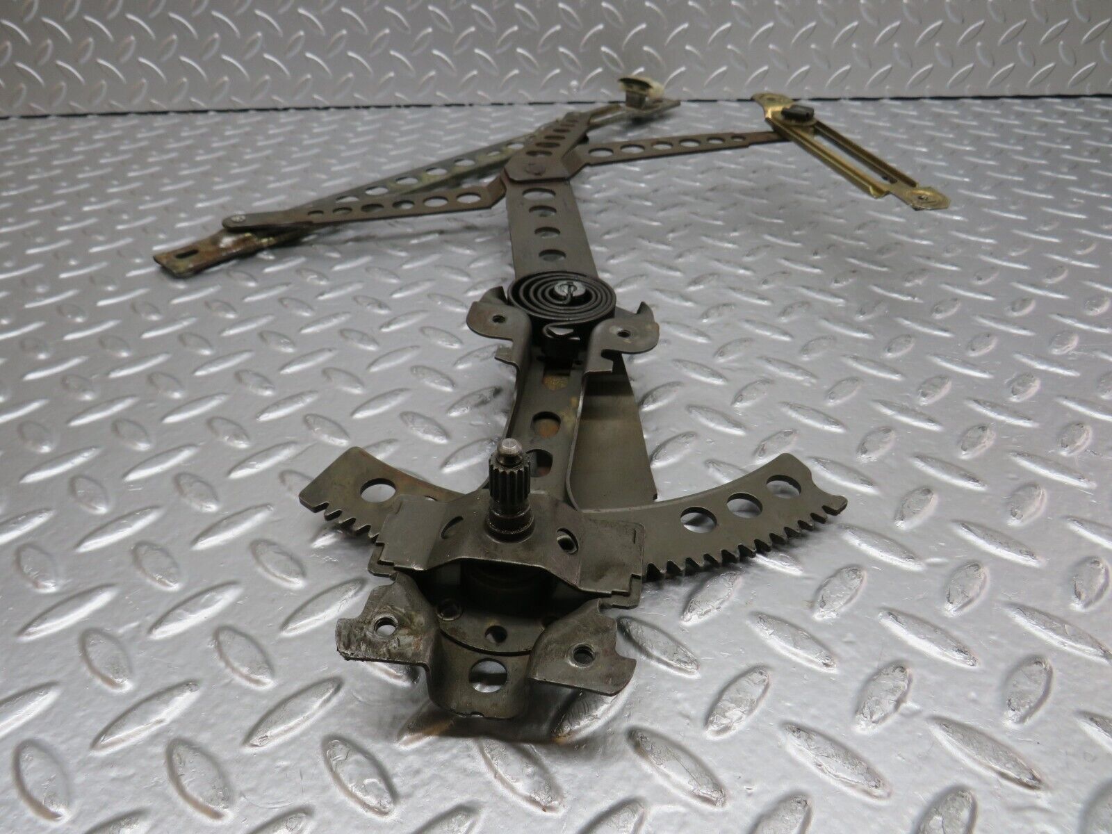 31140 Mercedes-Benz W123 200D Front Left Manual Window Regulator 1237200346