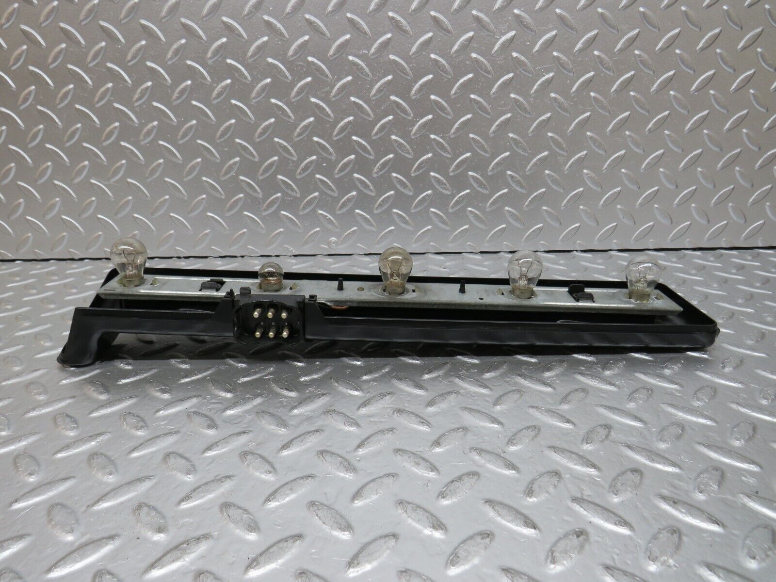 31054 Mercedes-Benz W123 200D Tail Light Bulb Holder Left Side 22064L