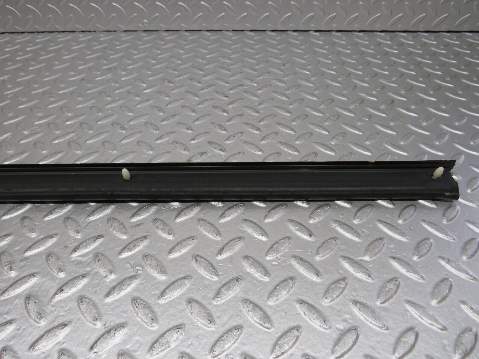 34220 Mercedes-Benz W124 260E Door Lower Sealing Rubber Trim Left