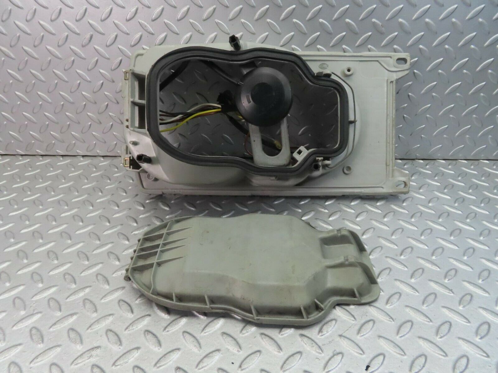 8470 Mercedes-Benz W123 Headlight Housing Hella Left