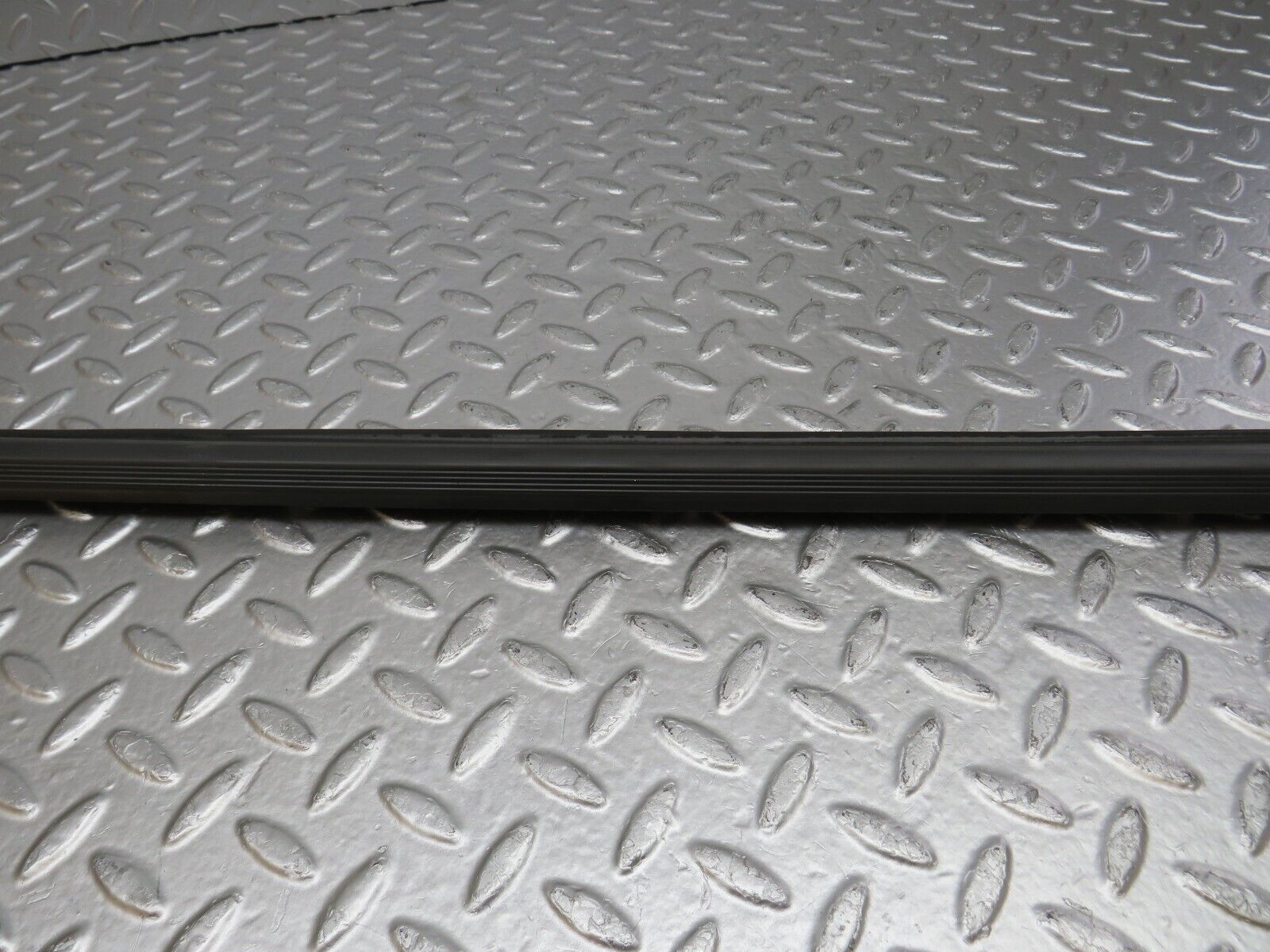 34220 Mercedes-Benz W124 260E Door Lower Sealing Rubber Trim Left