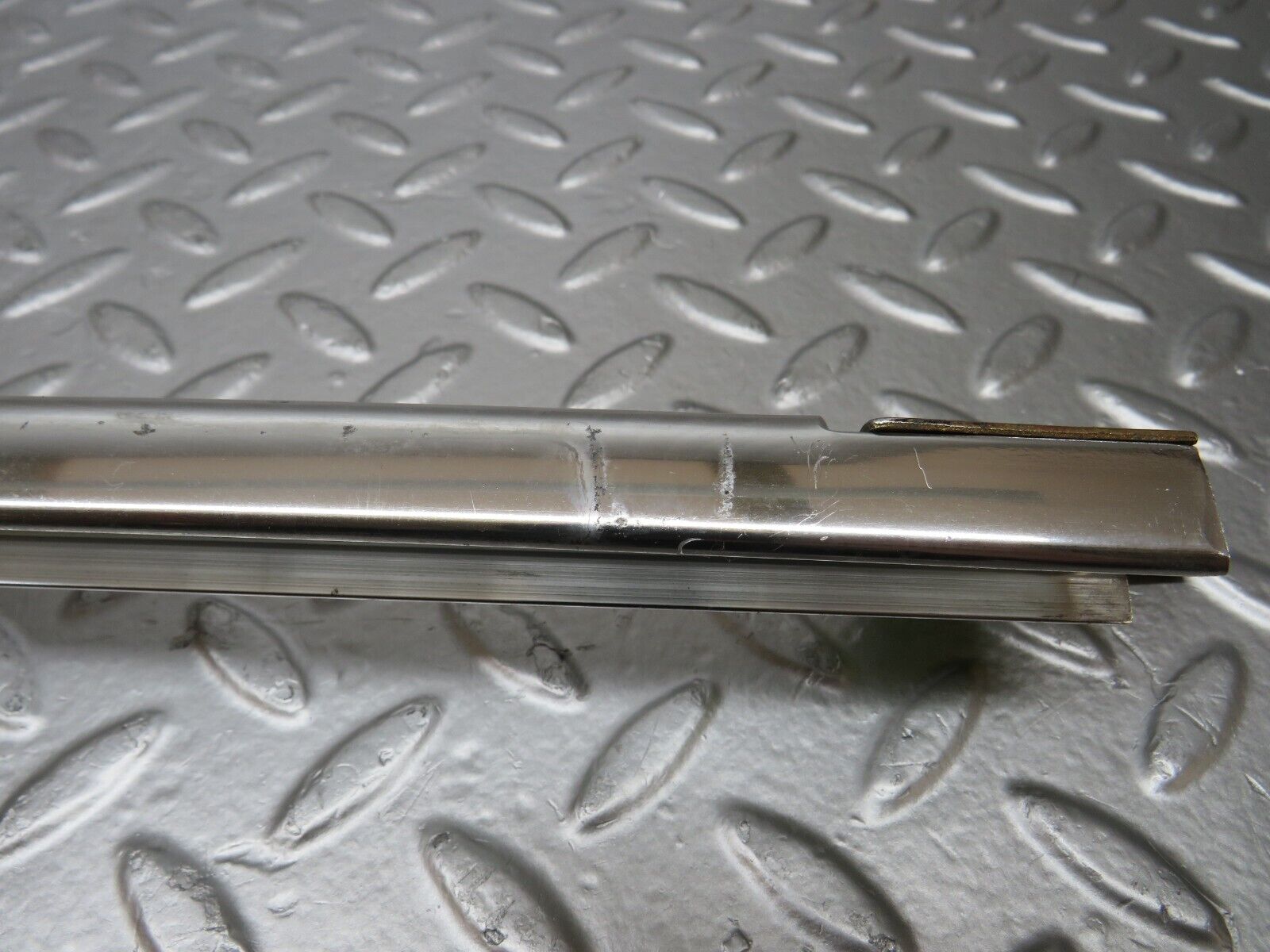 25591 Mercedes-Benz W123 200 Rear Left Chrome Window Channel
