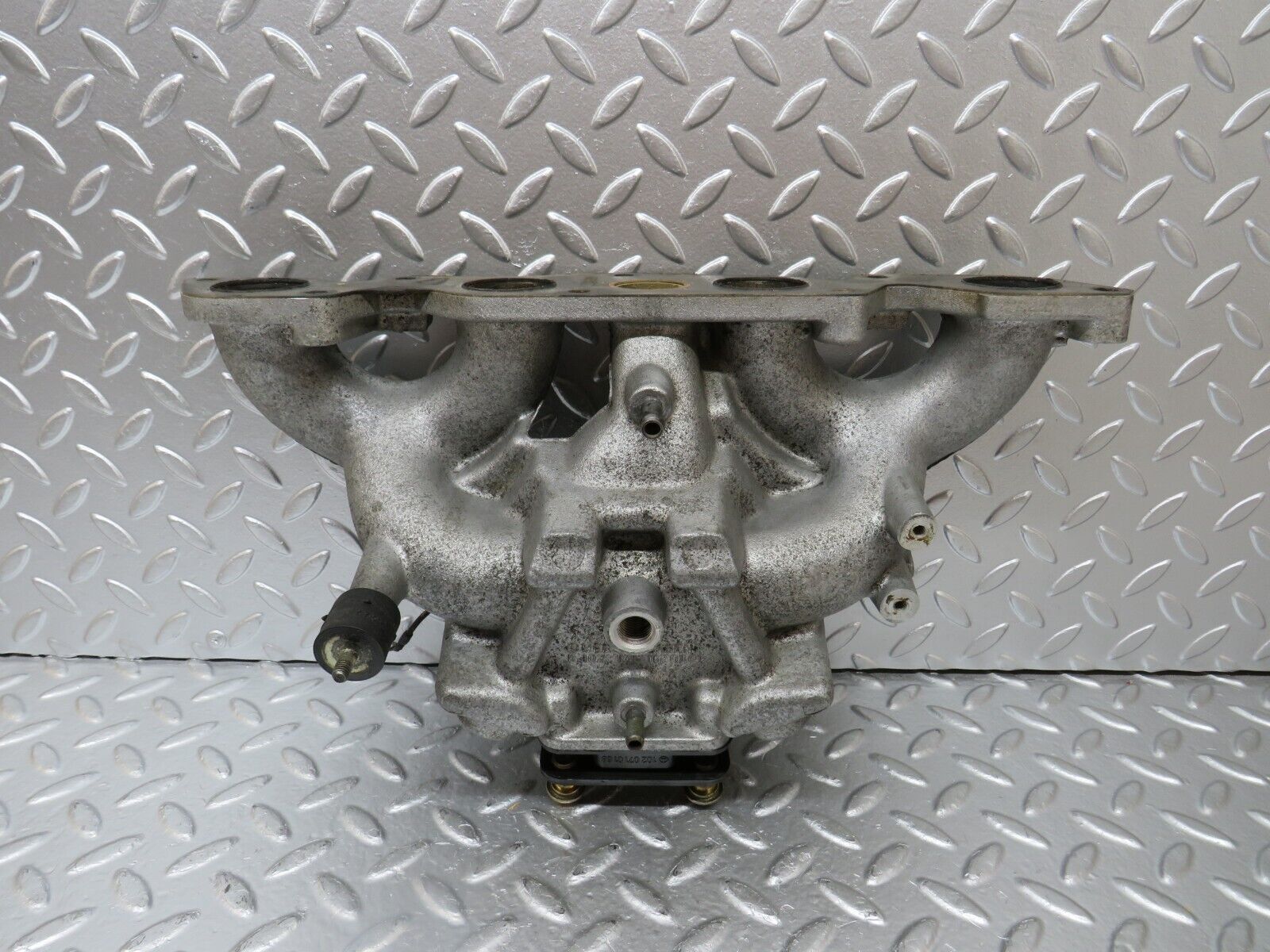 25625 Mercedes-Benz W123 200 Intake Manifold 1021411601