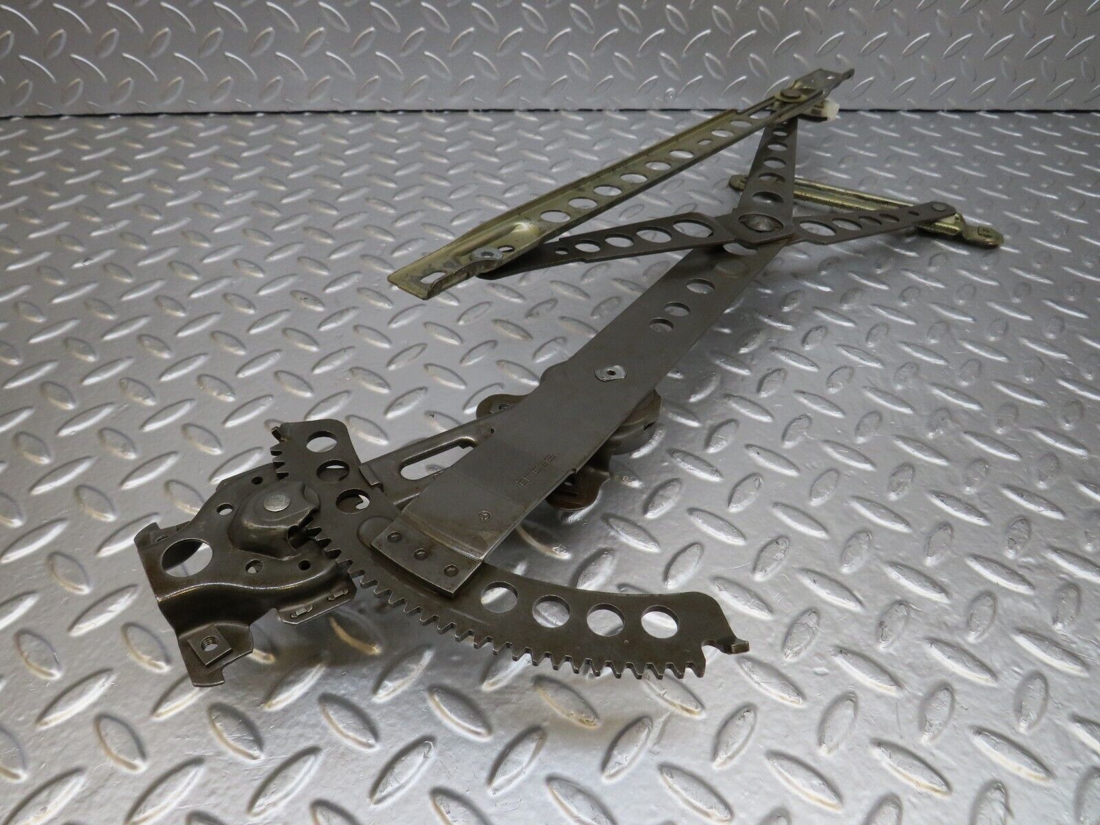 25454 Mercedes-Benz W123 200 Front Left Manual Window Regulator