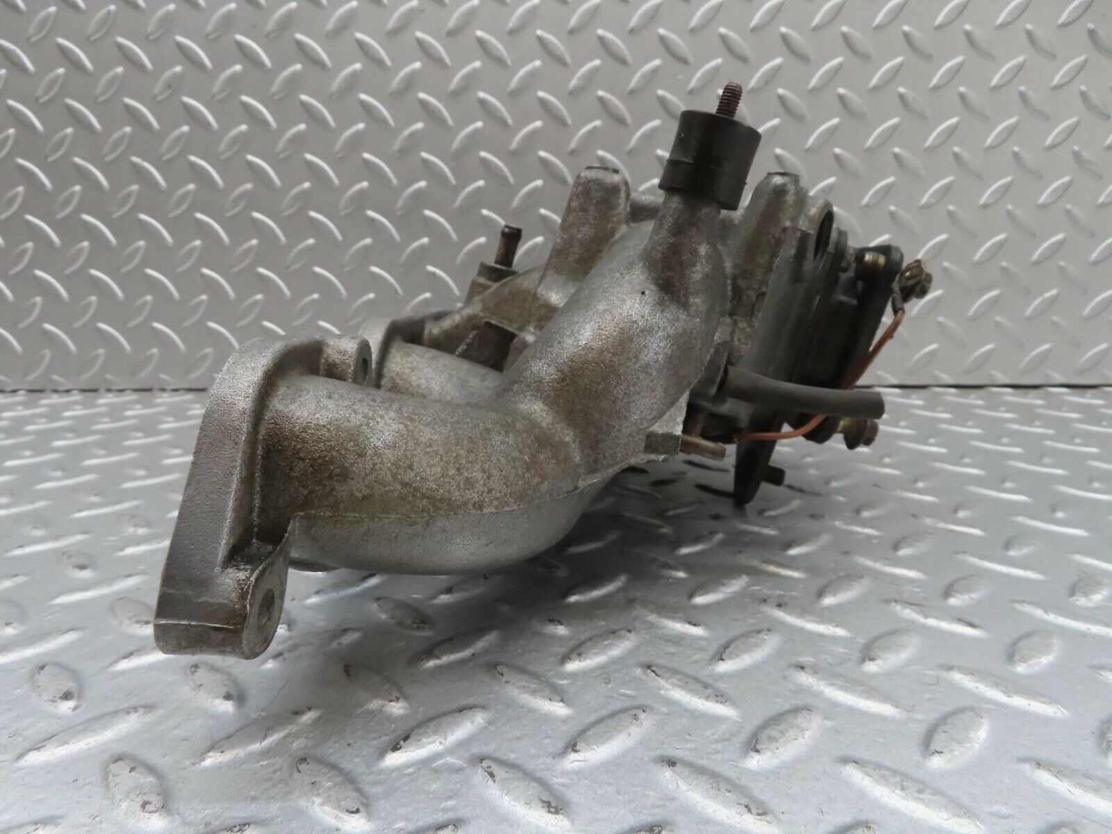 13582 Mercedes-Benz W123 200 Intake Manifold 1021411701