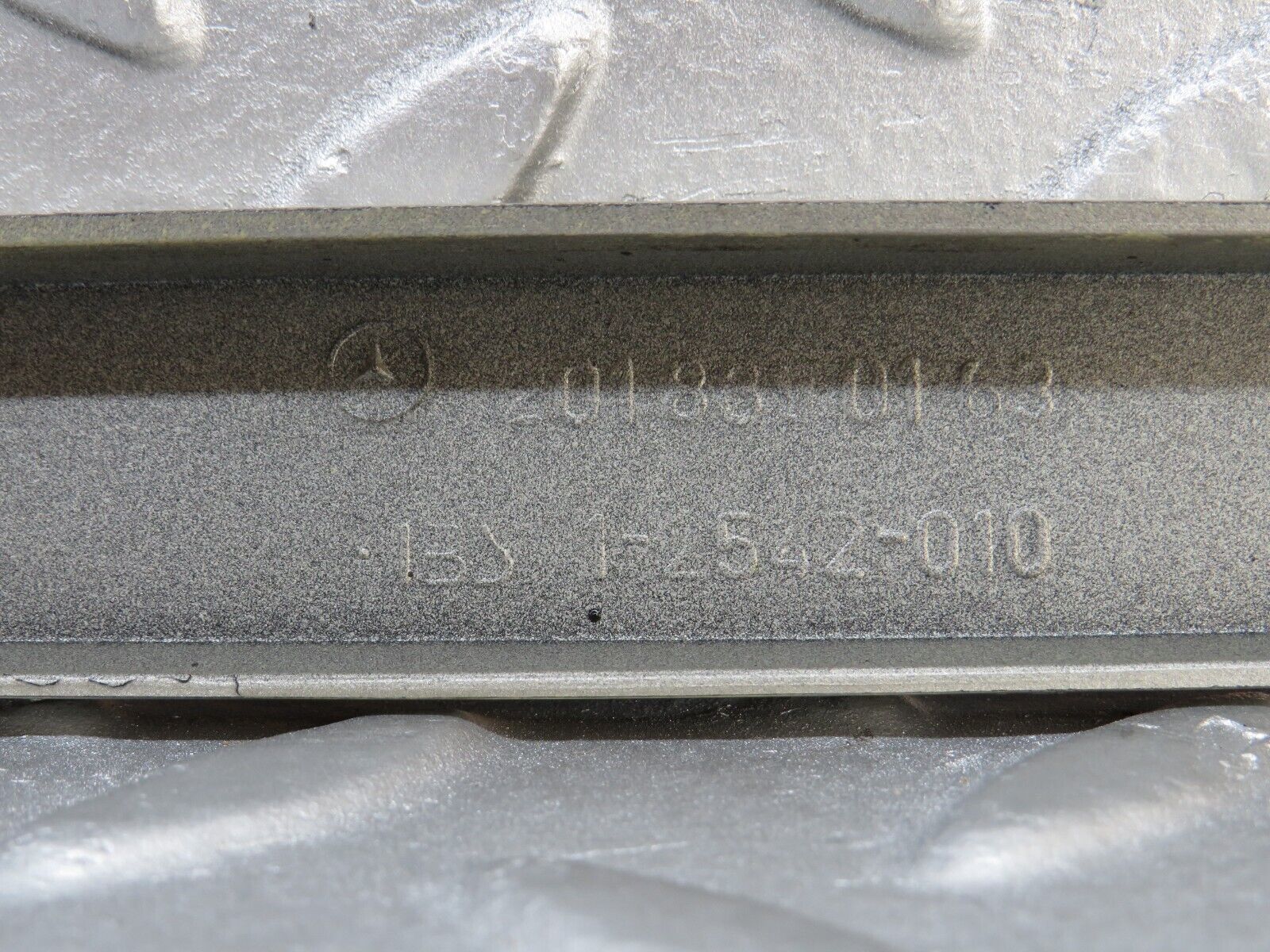 36519 Mercedes-Benz W201 190E 2.0L Under Headlight Trim Left Side 2018890163