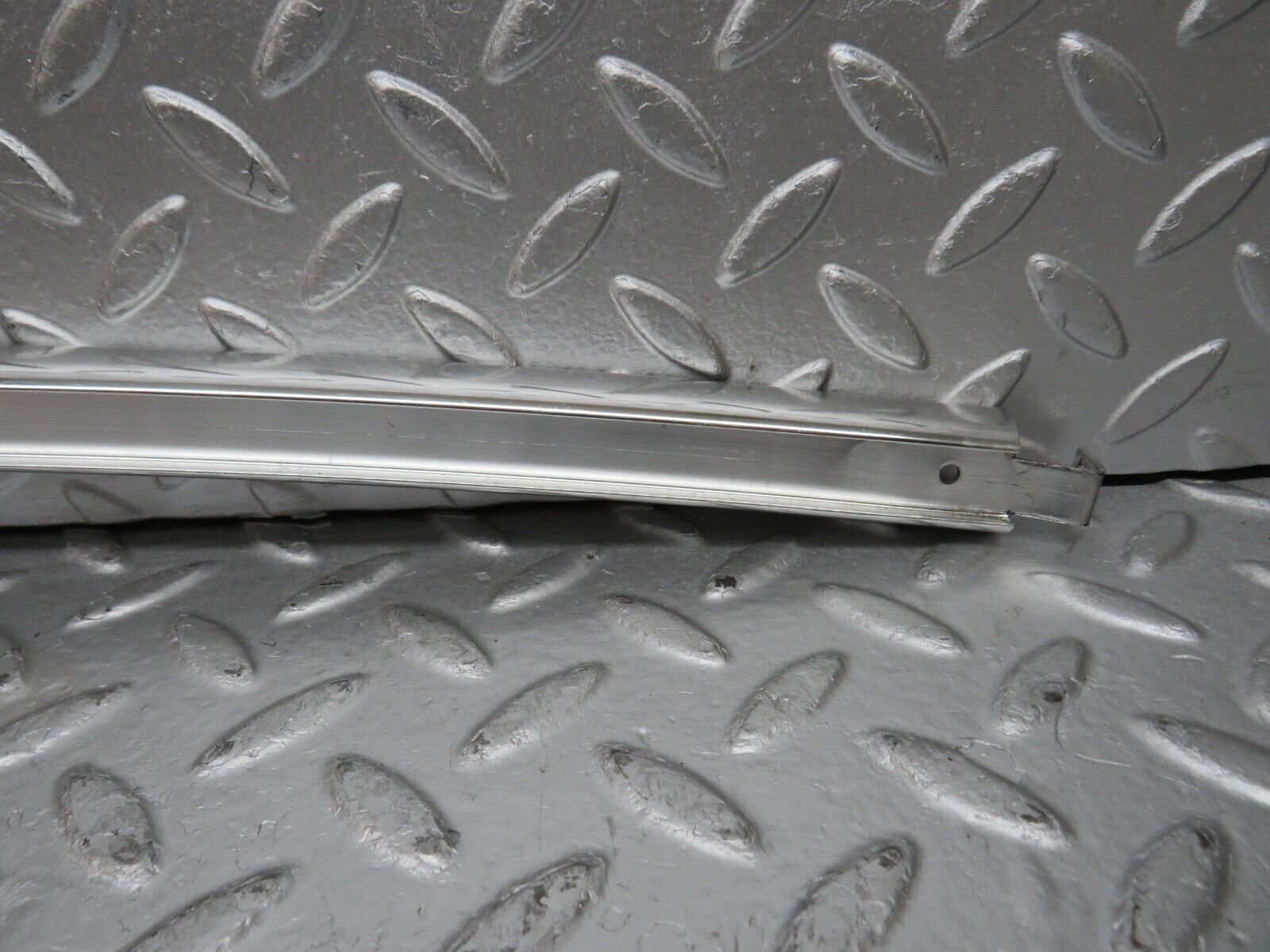 32086 Mercedes-Benz W123 230E Rear Left Chrome Window Channel