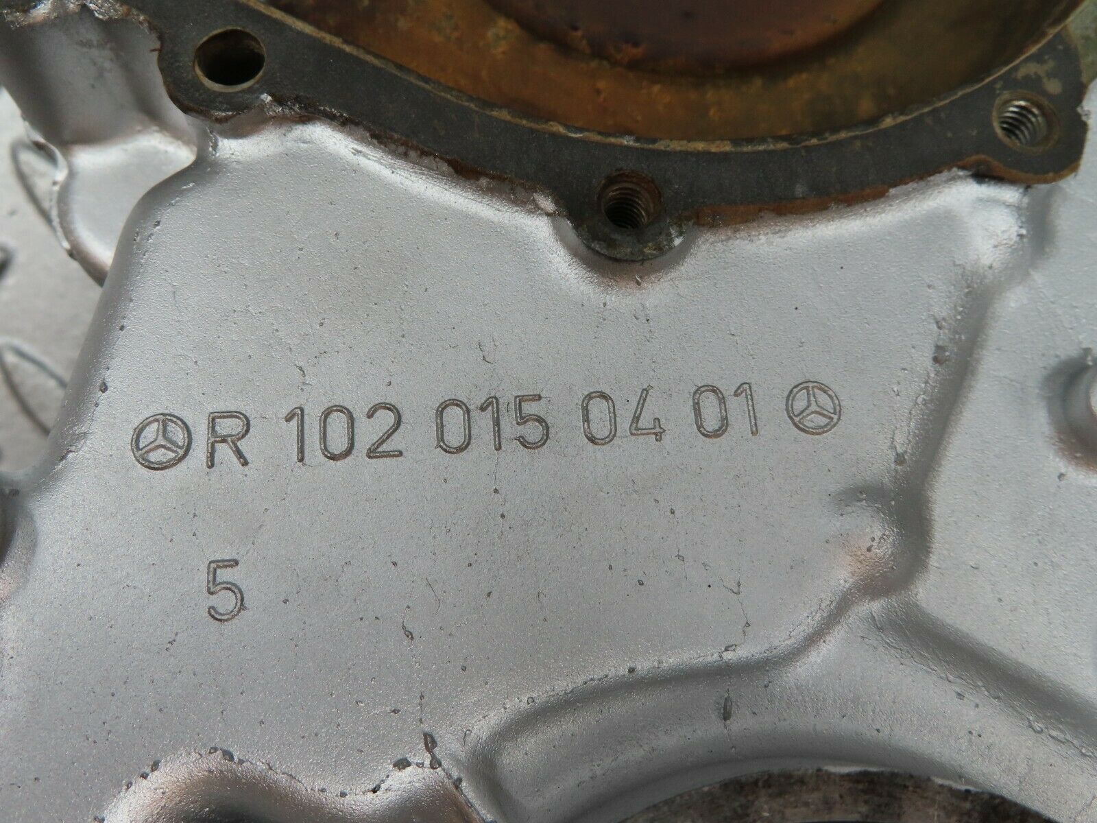 3964 Mercedes-Benz S123 200T Wagon Engine Timing - Oil Pump Cover & Oil Filter Housing 1020150401