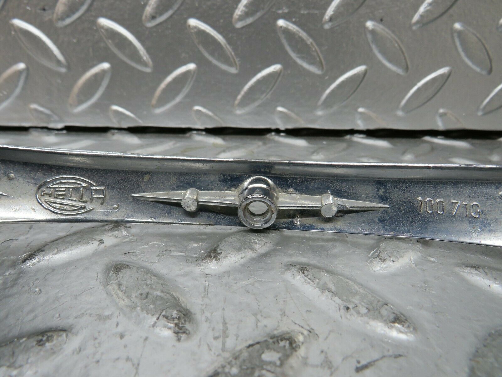 23494 Mercedes-Benz W114 280E Headlight Chrome Frame Hella 100710