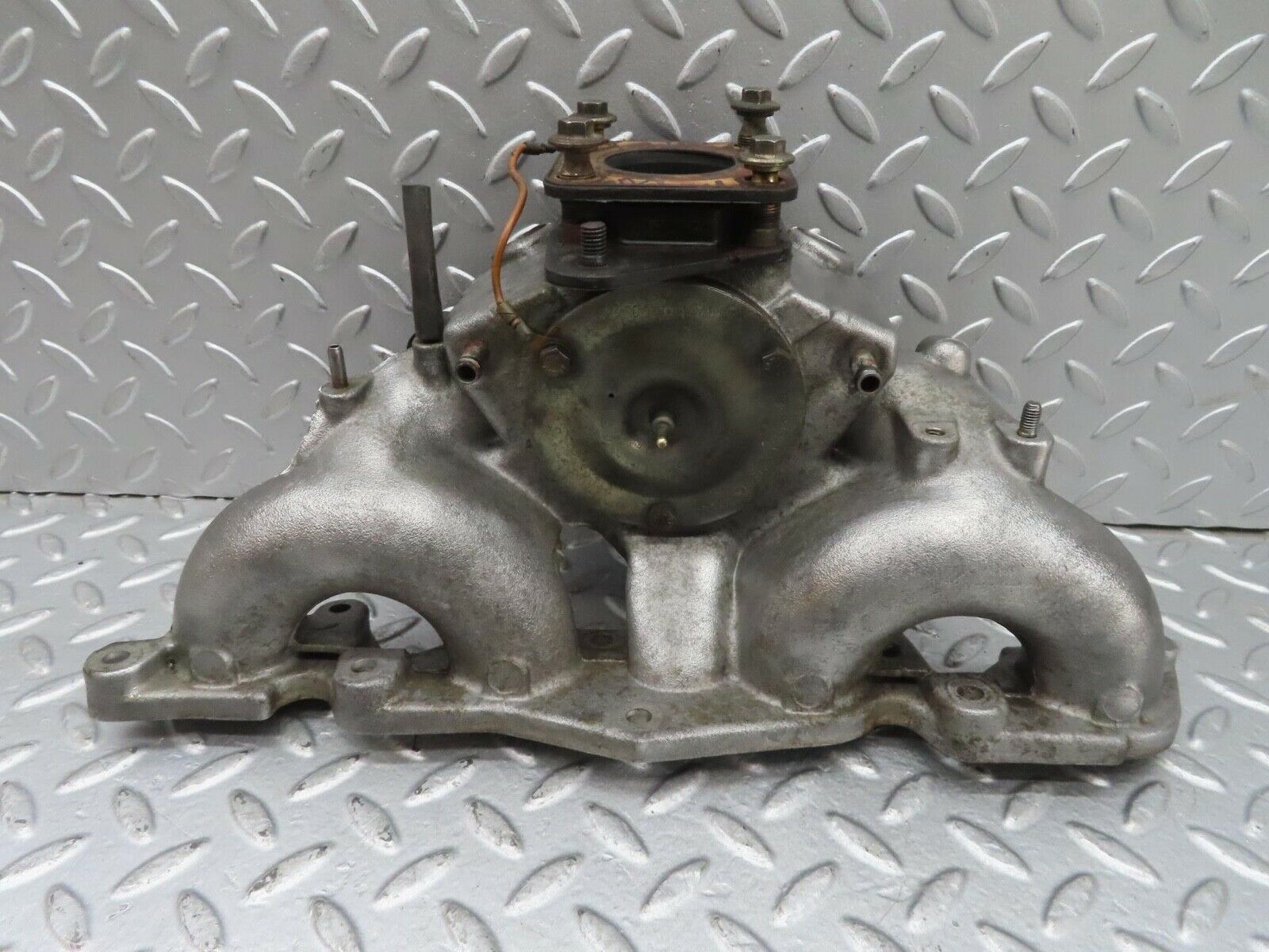 13582 Mercedes-Benz W123 200 Intake Manifold 1021411701