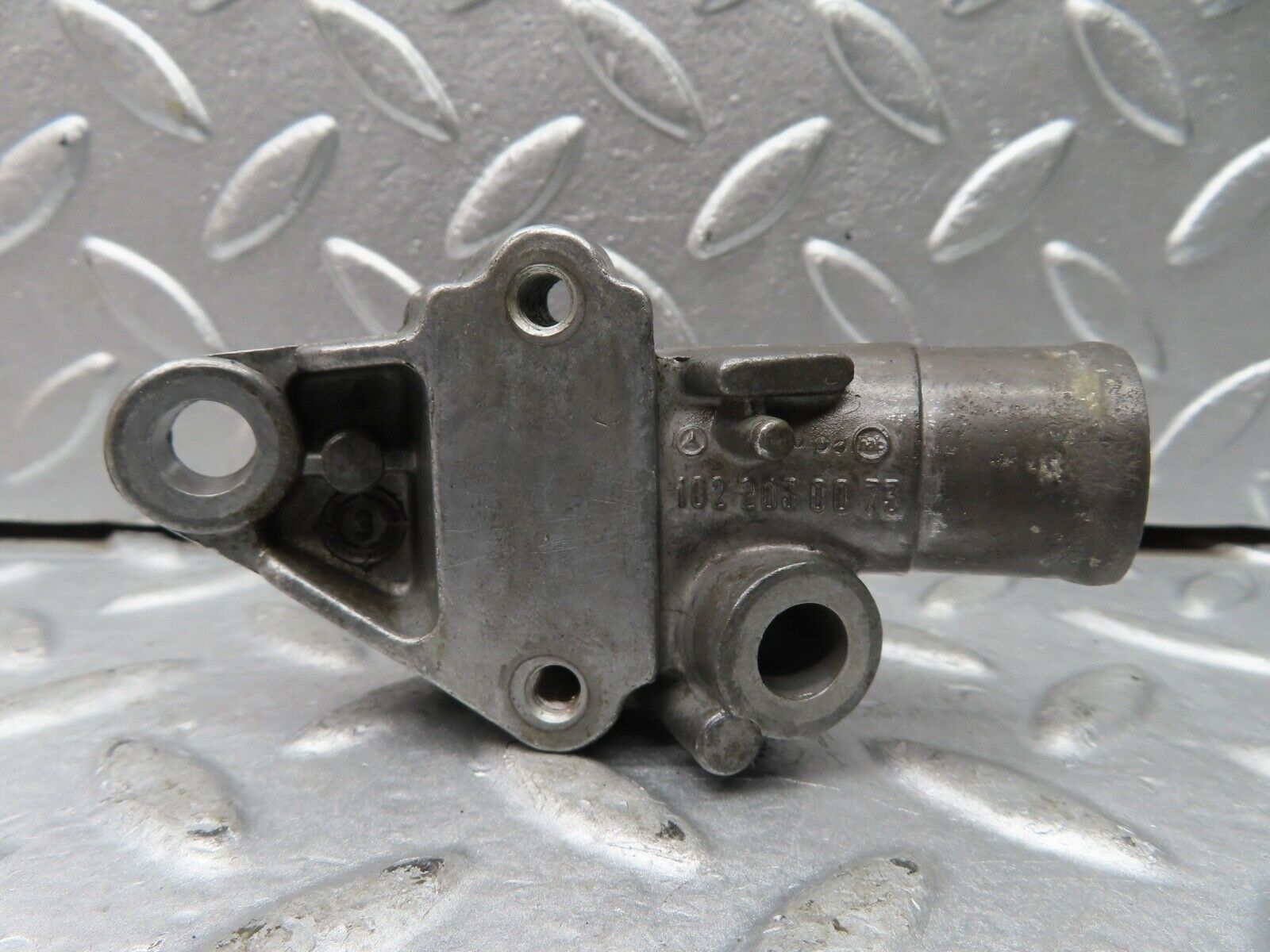 21300 Mercedes-Benz W123 230E Cooling Water Pump Housing Flange 1022030073