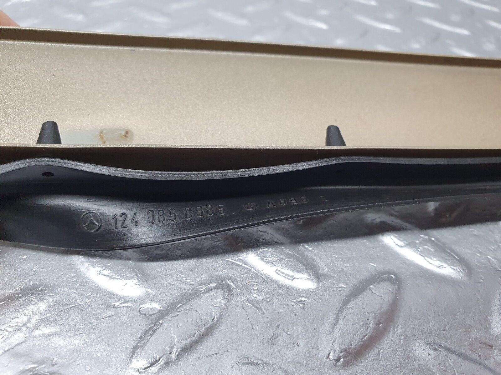 41486 Mercedes-Benz W124 200E Under Headlight Trim Right Side 1248850385