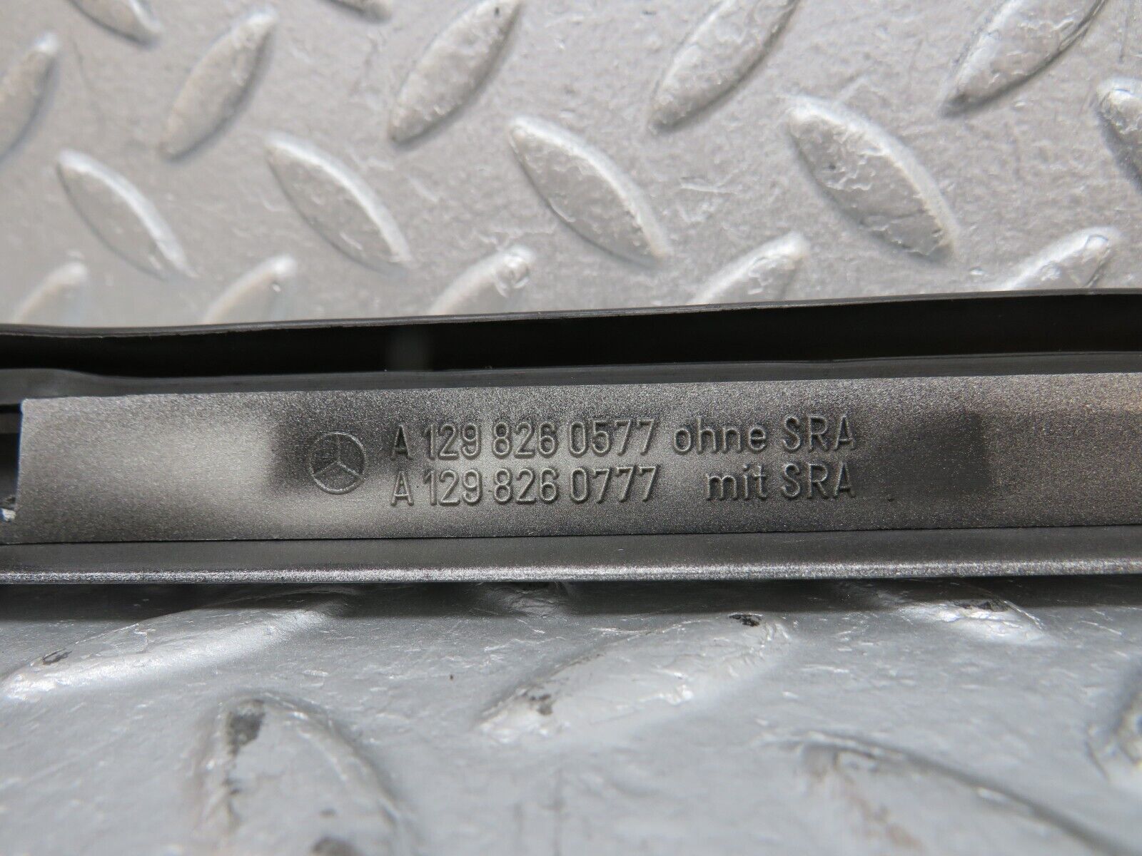 39695 Mercedes-Benz R129 320SL Coupe Left Headlight Lower Trim 1298260577 1298260777