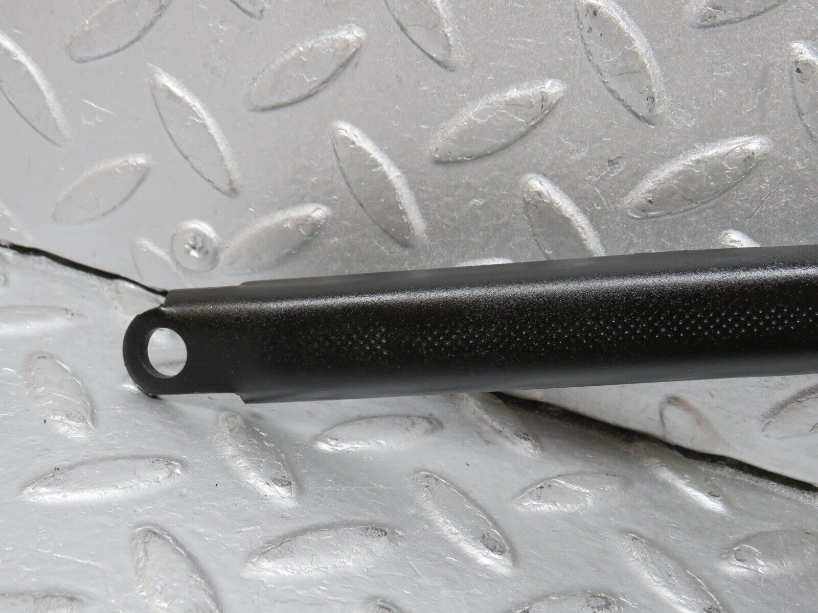 38930 Mercedes-Benz W201 190E 2.6L Belt Tensioner Bracket 1032021240