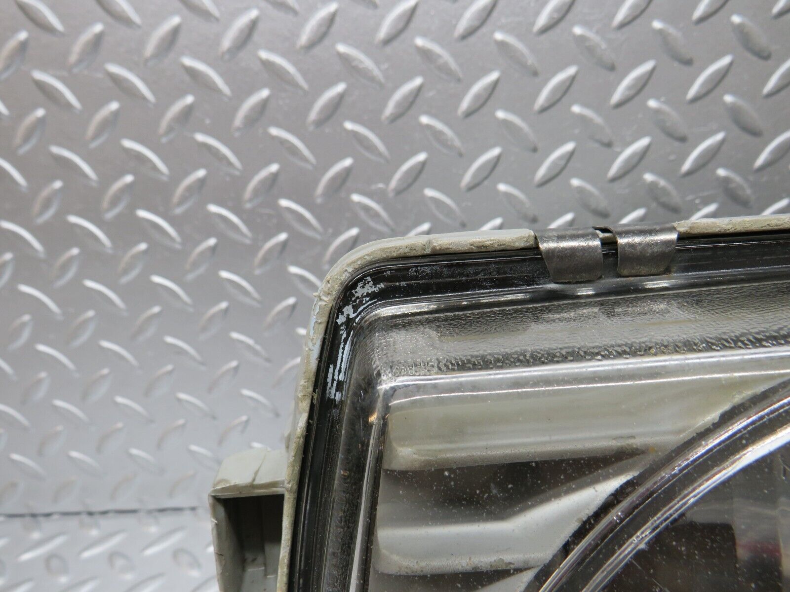 31058 Mercedes-Benz W123 200D Headlight Hella Left Side 117683-00