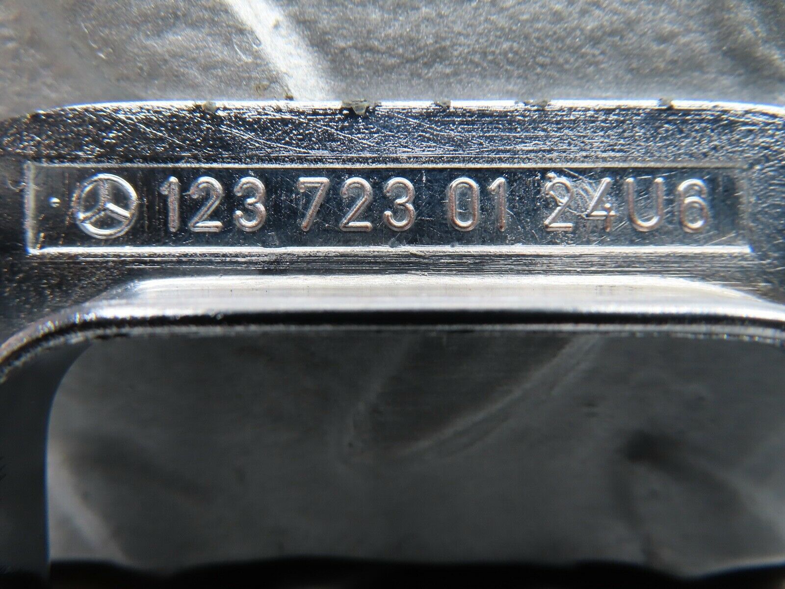 21083 Mercedes-Benz W123 230E Left Chrome Door Latch Trim 1237230124