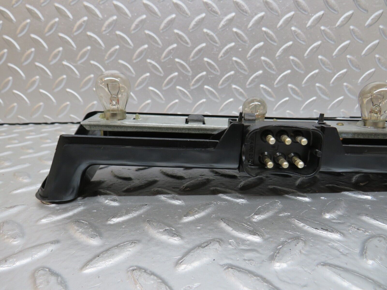 31054 Mercedes-Benz W123 200D Tail Light Bulb Holder Left Side 22064L