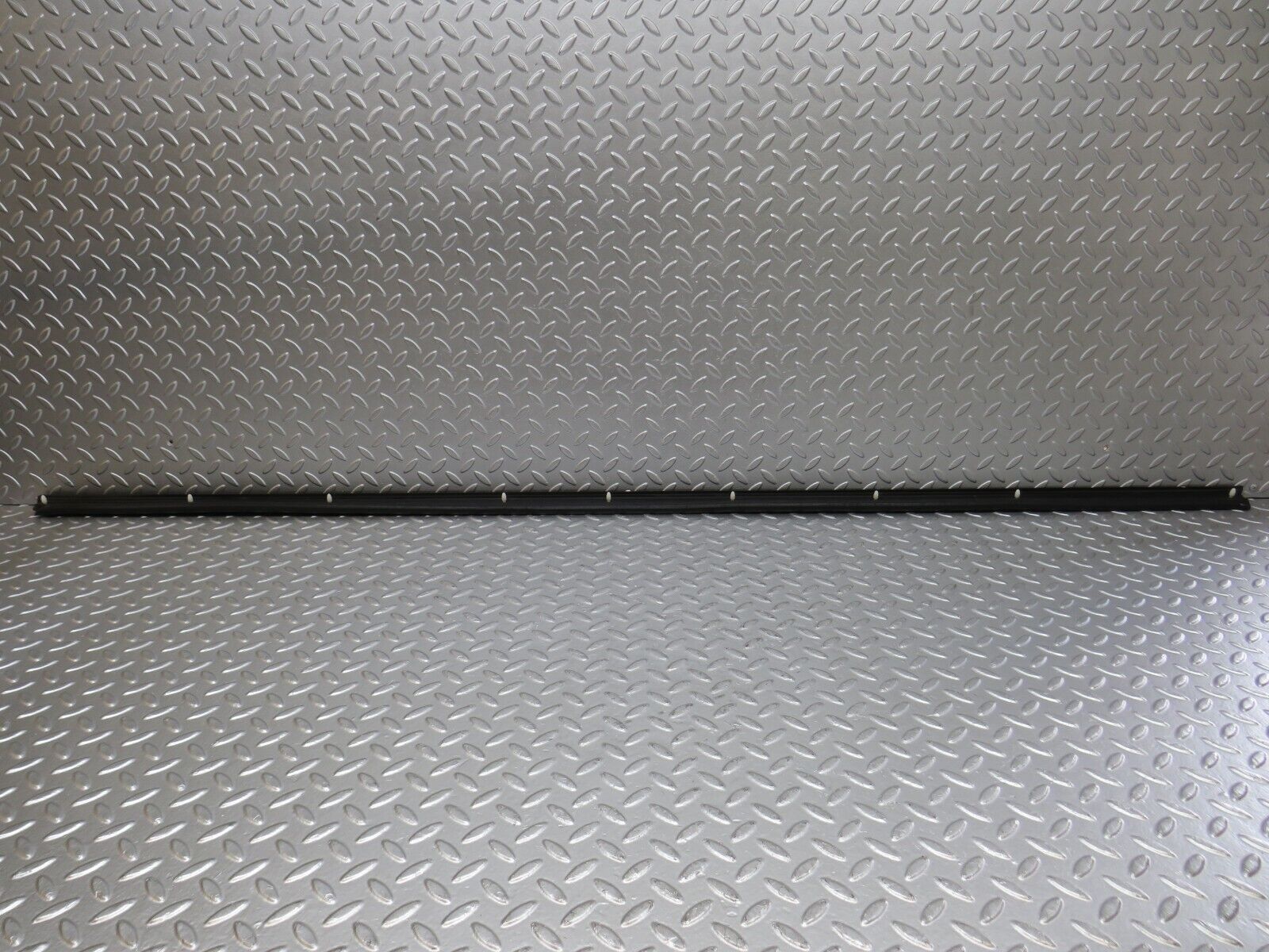 34220 Mercedes-Benz W124 260E Door Lower Sealing Rubber Trim Left