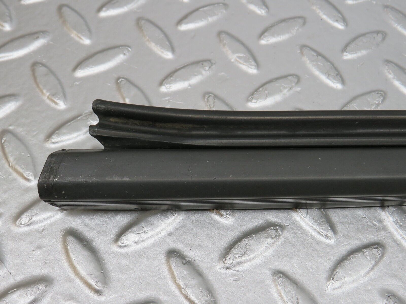 34220 Mercedes-Benz W124 260E Door Lower Sealing Rubber Trim Left