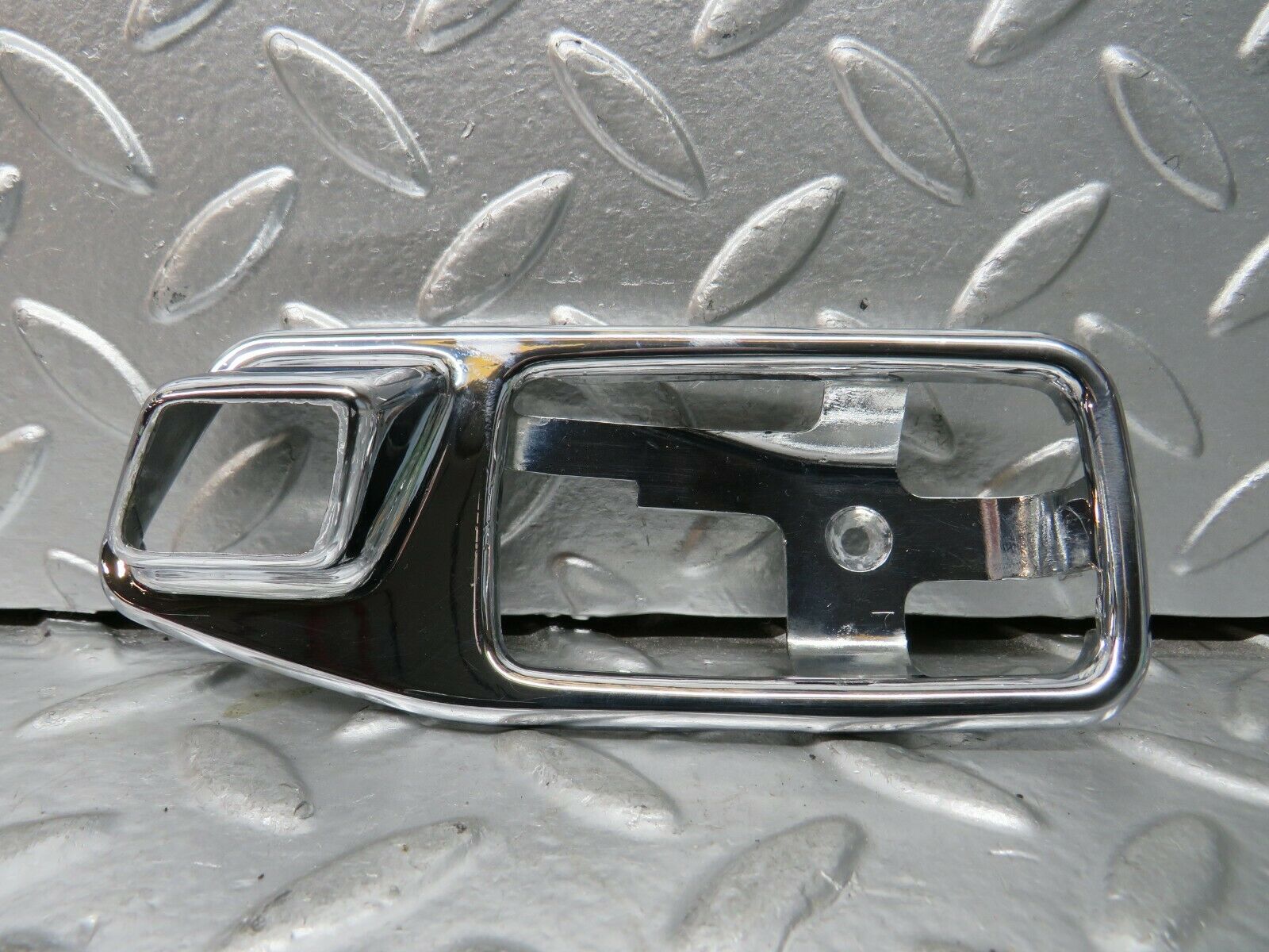 23264 Mercedes-Benz W116 350SE Left Door Handle Surround 1087660111