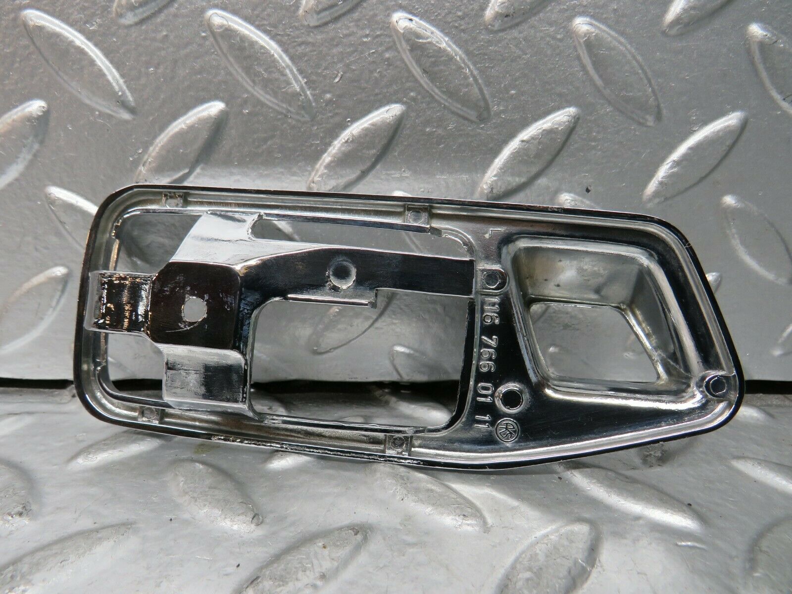 23264 Mercedes-Benz W116 350SE Left Door Handle Surround 1087660111