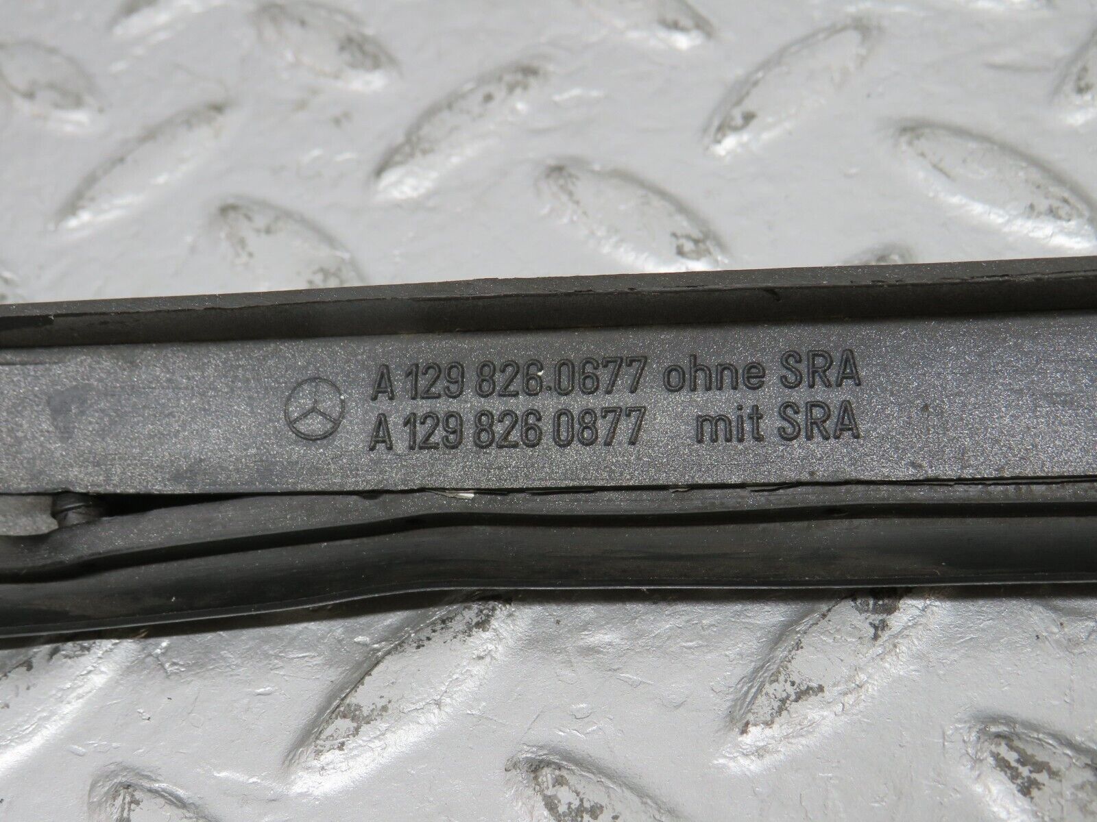 39694 Mercedes-Benz R129 320SL Coupe Right Headlight Lower Trim 1298260677 1298260877