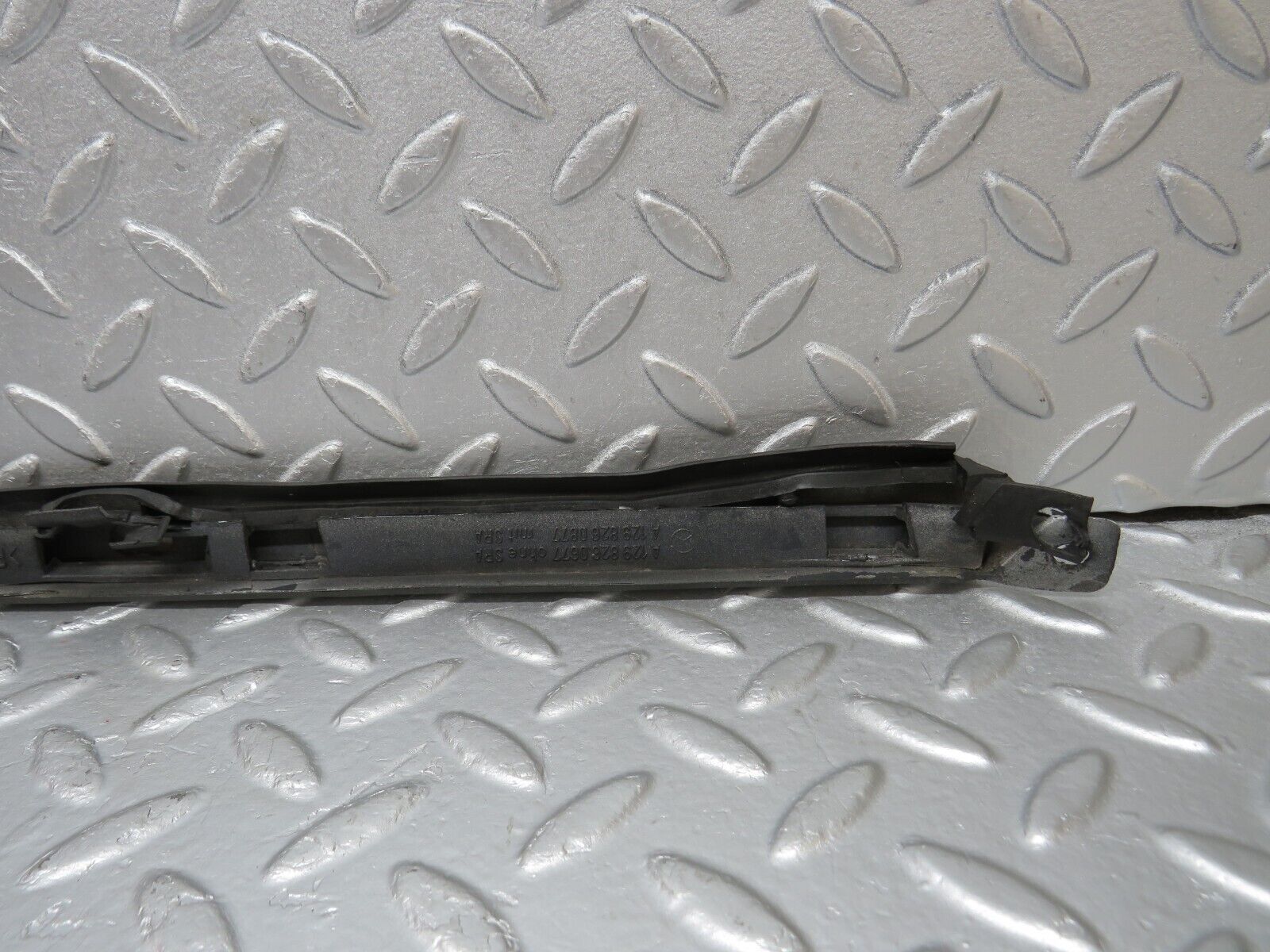 39694 Mercedes-Benz R129 320SL Coupe Right Headlight Lower Trim 1298260677 1298260877