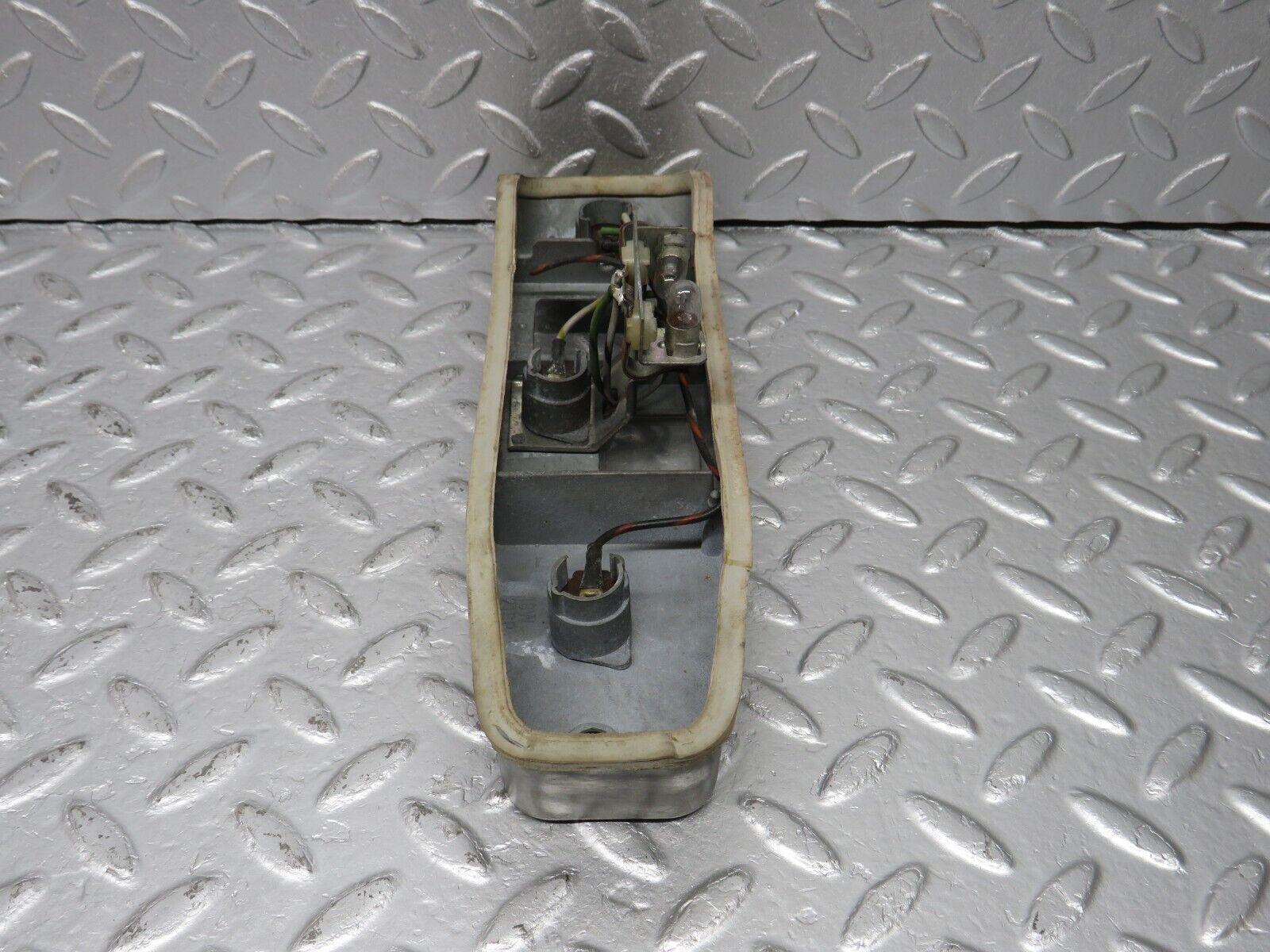 40297 Mercedes-Benz W110 230 Tail Light Bulb Holder Left Side SR K23300