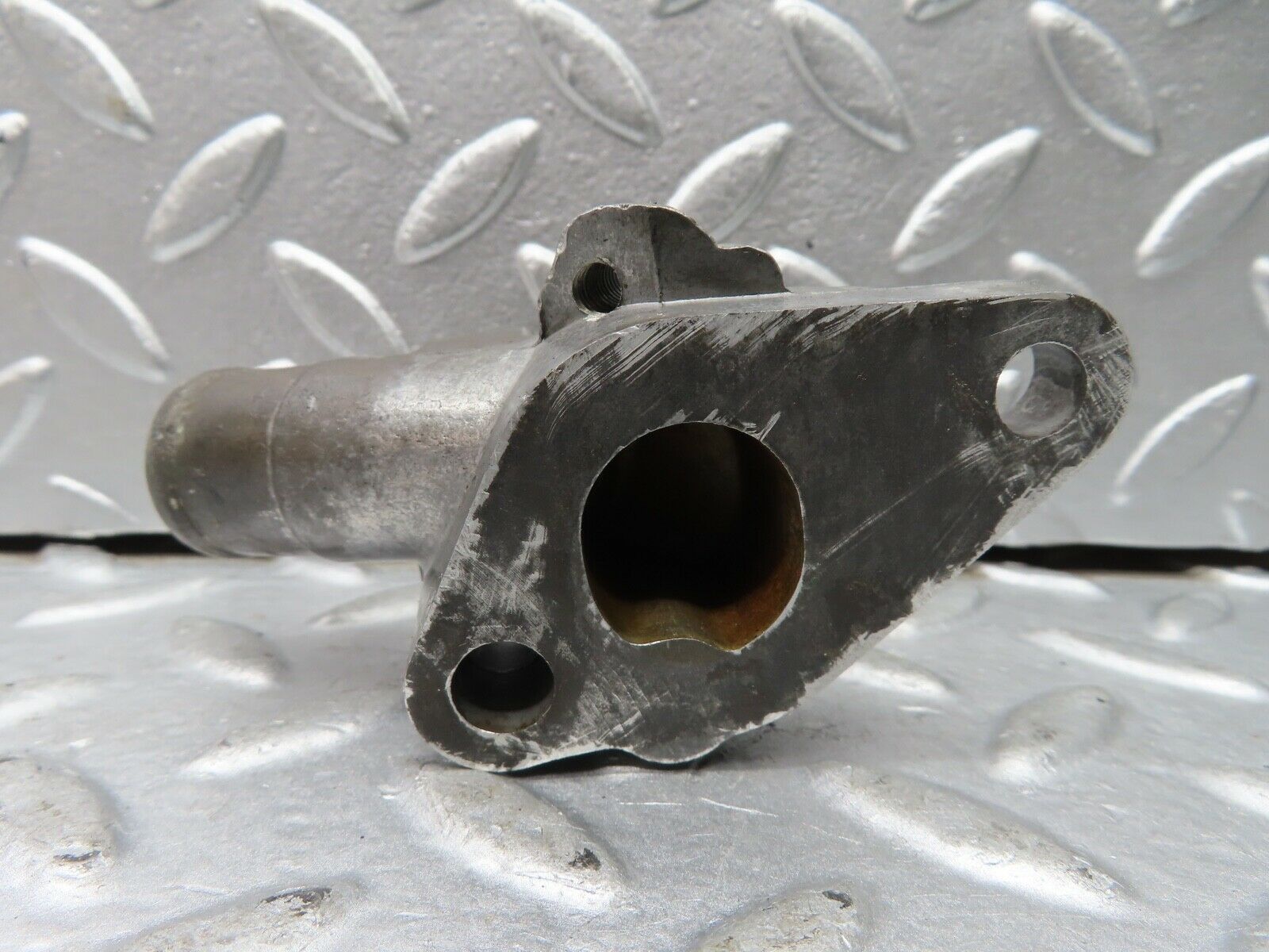 21300 Mercedes-Benz W123 230E Cooling Water Pump Housing Flange 1022030073