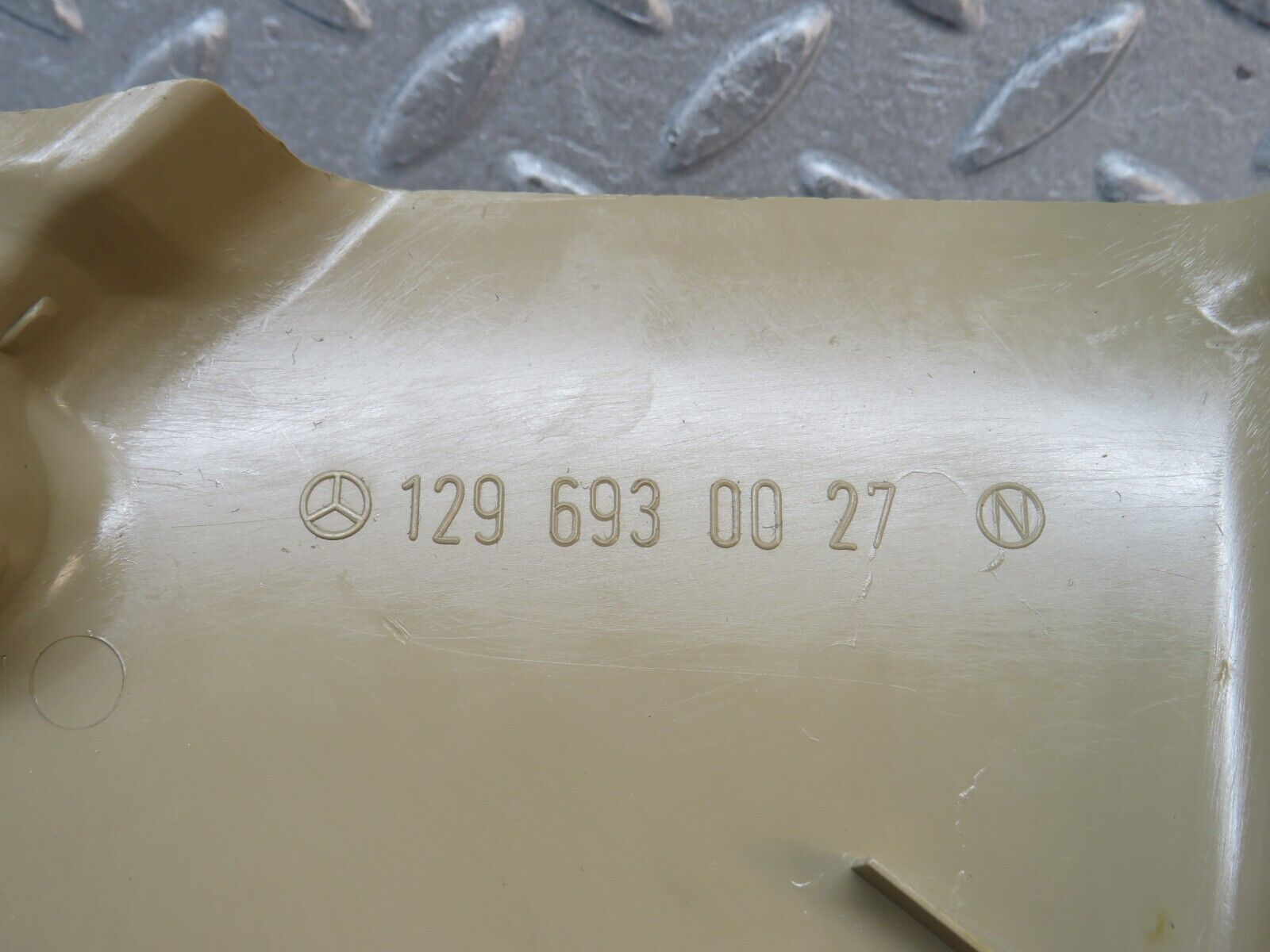 38267 Mercedes-Benz R129 280SL Coupe Trunk Lock Cover Cream 1296930027