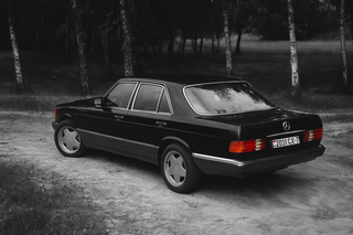 Mercedes W126 S-Class classic black saloon car custom wheels rear photo