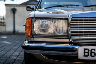 Mercedes W123 classic gold front headlight grille photo