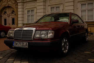 Mercedes W124 dark red car