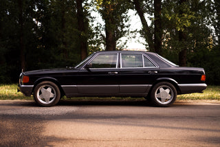 Mercedes W126 S-Class black car side profile