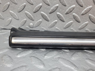 W123 Coupe front left fender wing lower trim cover used OEM