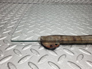 W108 door window glass front left used OEM