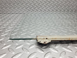 W108 door window glass rear left used OEM