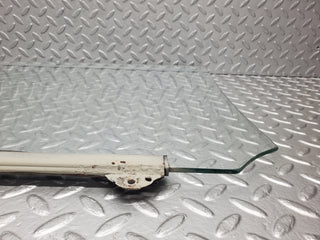W108 door window glass rear left used OEM