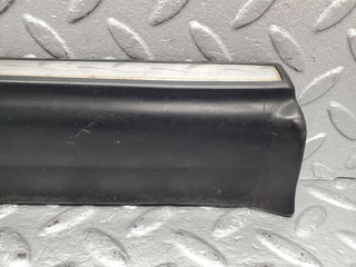 W123 Lang front left lower moulding trim used OEM