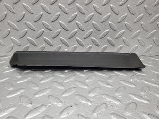W123 Lang front left lower moulding trim used OEM
