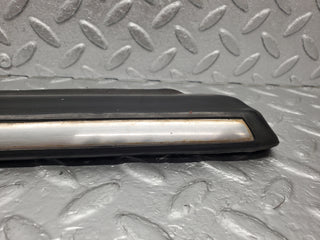 W123 Lang front left lower moulding trim used OEM