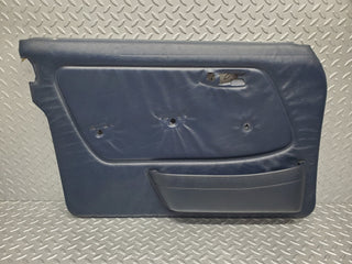 W123 Lang front left door card blue used OEM