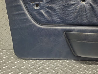 W123 Lang front left door card blue used OEM