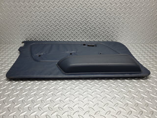 W123 Lang front left door card blue used OEM