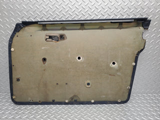 W123 Lang front left door card blue used OEM