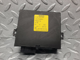 W220 headlight control module used OEM