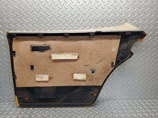 W116 rear left door card beige used OEM