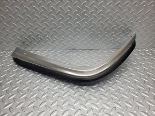 W116 front left upper bumper corner used OEM