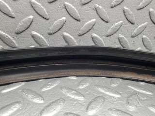 R107 SL front bumper rubber right side used OEM