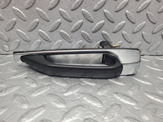 W123 exterior chrome door handle rear used OEM